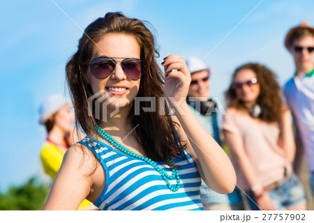 stylish young woman in sunglasses 27757902
