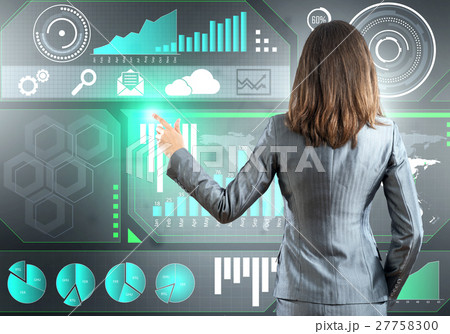 Businesswoman standing with back and pressing icon on media screen Businesswoman standing with back and pressing icon on media screen 27758300