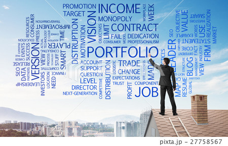 Young businessman standing on house roof and writing leadership skill concept. Mixed media 27758567