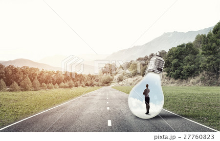 Businesswoman inside light bulb 27760823