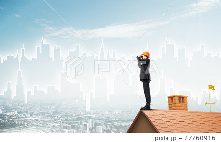 Engineer man standing on roof and looking in binoculars. Mixed media 27760916