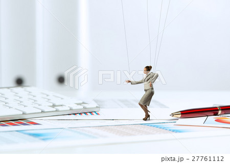 businesswoman puppet doll is on the desk businesswoman puppet doll is on the desk 27761112