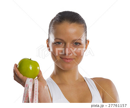 young attractive woman with measuring tape 27761157