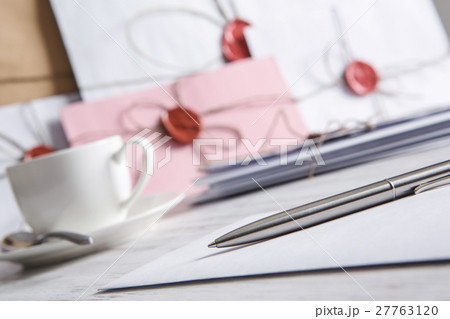 Letter with seal on table Letter with seal on table 27763120