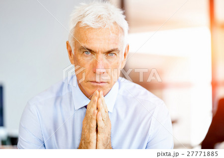 Businessman at the office Businessman at the office 27771885