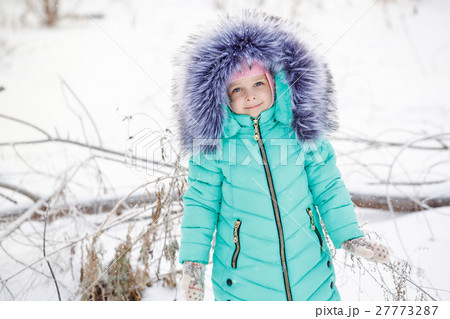 Little girl smiles in winter. Little girl smiles in winter. 27773287