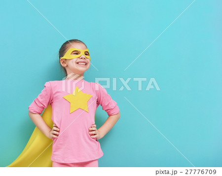 child plays superhero 27776709