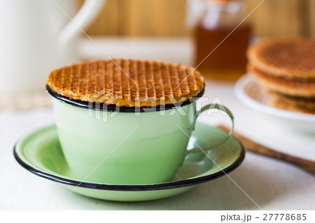 Stroopwafel on a cup of coffee Stroopwafel on a cup of coffee 27778685