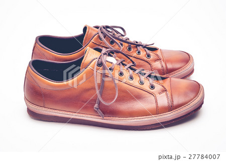man leather brown shoes on white background. 27784007