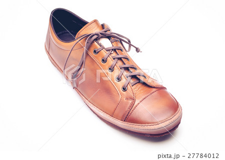 man leather brown shoes on white background. man leather brown shoes on white background. 27784012