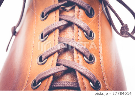 man leather brown shoes on white background. 27784014