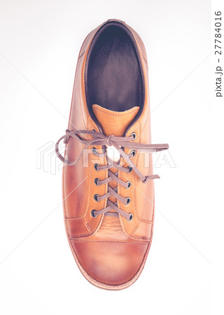 man leather brown shoes on white background. man leather brown shoes on white background. 27784016