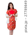asian woman wearing red dress holding 27789849