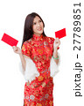 asian woman wearing red dress holding 27789851