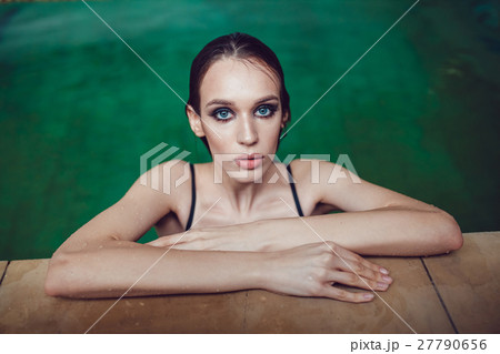 Beautiful brunette woman with a professional make 27790656