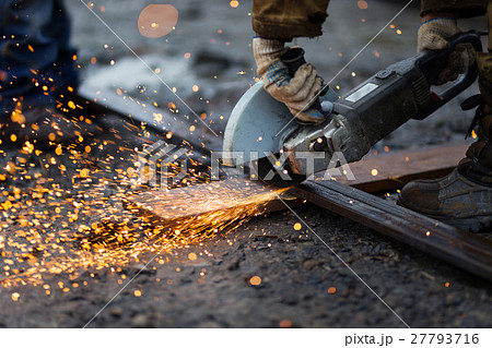 Cutting metal with angle grinder. 27793716