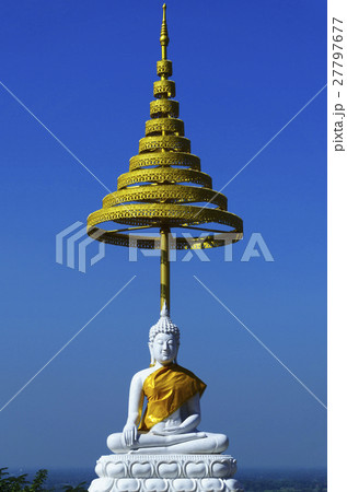 white buddha statue on blue sky 27797677