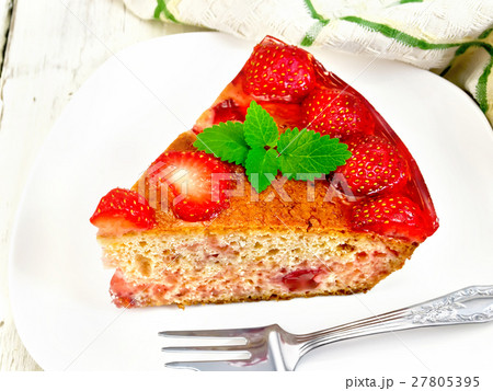 Pie strawberry with jelly in plate on board 27805395