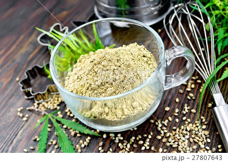 Flour hemp in glass cup on board 27807643