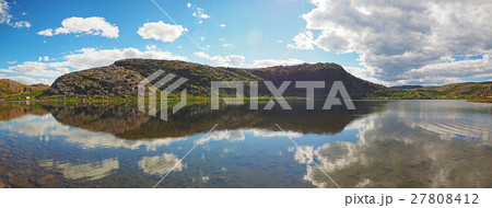 Reflection in a lake in the north. Panorama 27808412