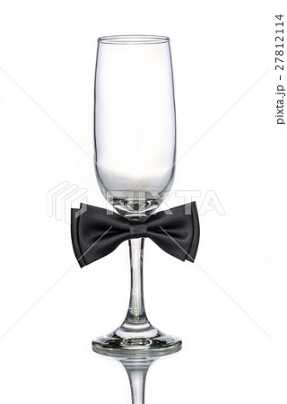 empty champagne glass with bow tie 27812114