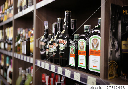 Wine bottles in wine shop 27812448