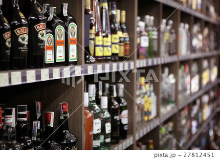 Wine bottles in wine shop 27812451