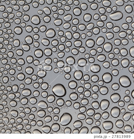Drops on transparent surface 27813989