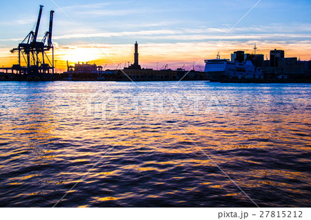 sunset at Genoa's port, silhouette of the Lanterna 27815212