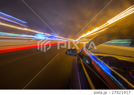 View from Side of Car moving in a night city 27821917