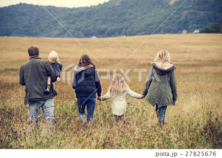 Family Walking Field Nature Togetherness Concept Family Walking Field Nature Togetherness Concept 27825676