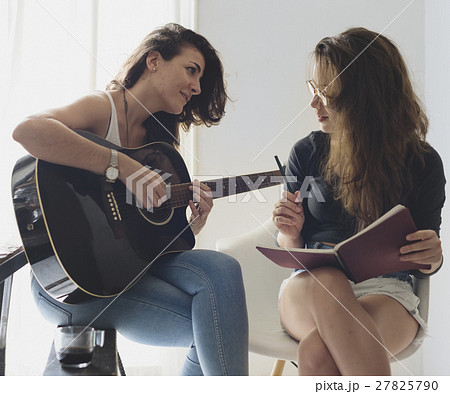 Lesbian Couple Together Indoors Concept Lesbian Couple Together Indoors Concept 27825790