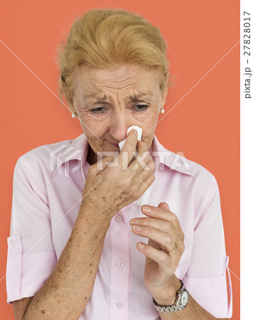 Senior Women Blowing Nose Concept 27828017
