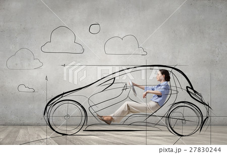 Woman driving old styled drawn car 27830244