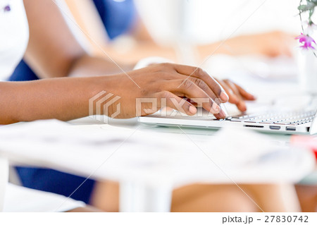 Image of woman's hands typing Image of woman's hands typing 27830742