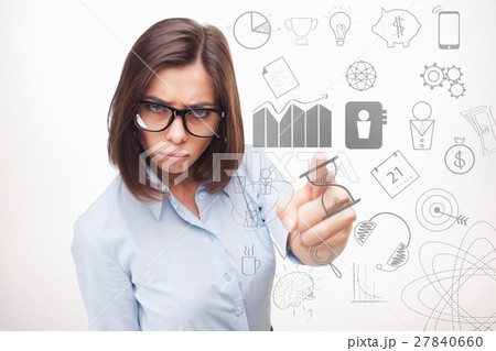 Business woman thinking many ideas. 27840660