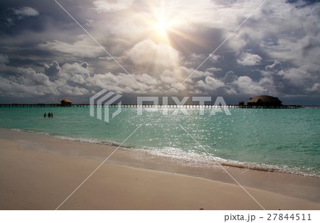 Maldives. A sandy beach and an ocean coast. 27844511