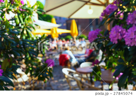 Outdoor cafe with flowers in the old town. Blurry Outdoor cafe with flowers in the old town. Blurry 27845074