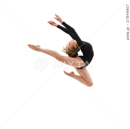 Young slim gymnast in gracefull jump studio shot Young slim gymnast in gracefull jump studio shot 27849907