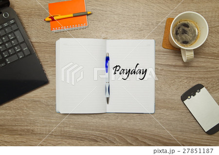Open notebook with text "Payday"  27851187