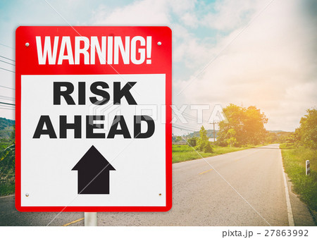 sign on the road ahead say Risk Ahead sign on the road ahead say Risk Ahead 27863992