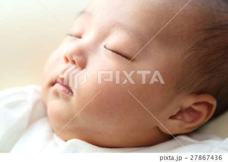 赤ちゃんの寝顔の写真素材