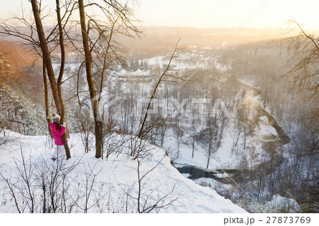 Little girl admiring a view of Vilnia river Little girl admiring a view of Vilnia river 27873769