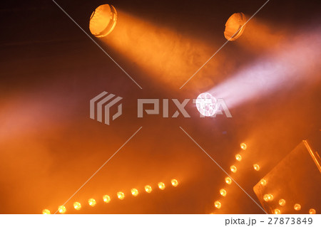 Spot lights with yellow rays in smoke 27873849