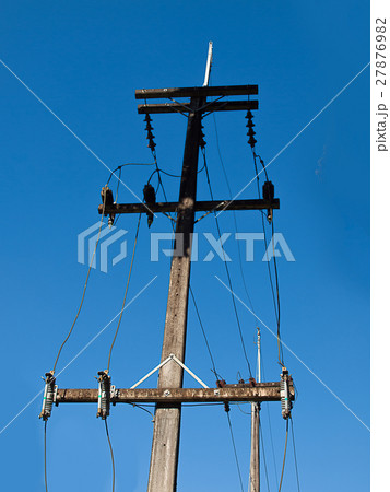 electric pole power lines and wires . 27876982