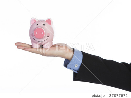 Man's hand with piggy hand 27877672
