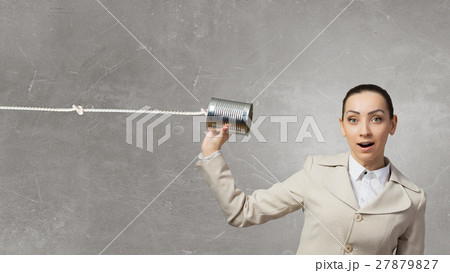 Woman using deaf phone 27879827