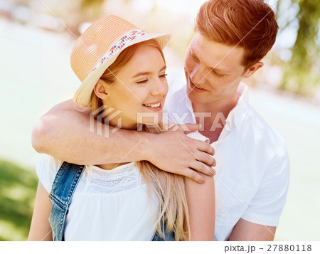 Young couple relaxing in park 27880118