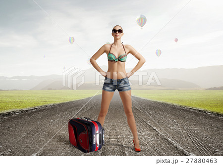 Hitch hiker woman on road 27880463