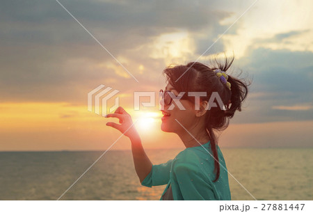 head shot of beautiful asian younger woman  27881447
